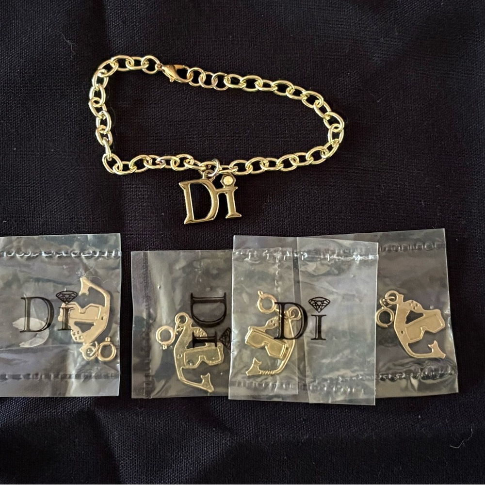 Diamond International Gold Charm Bracelet Set. 8 bracelets multiple charms. - Picture 6 of 15